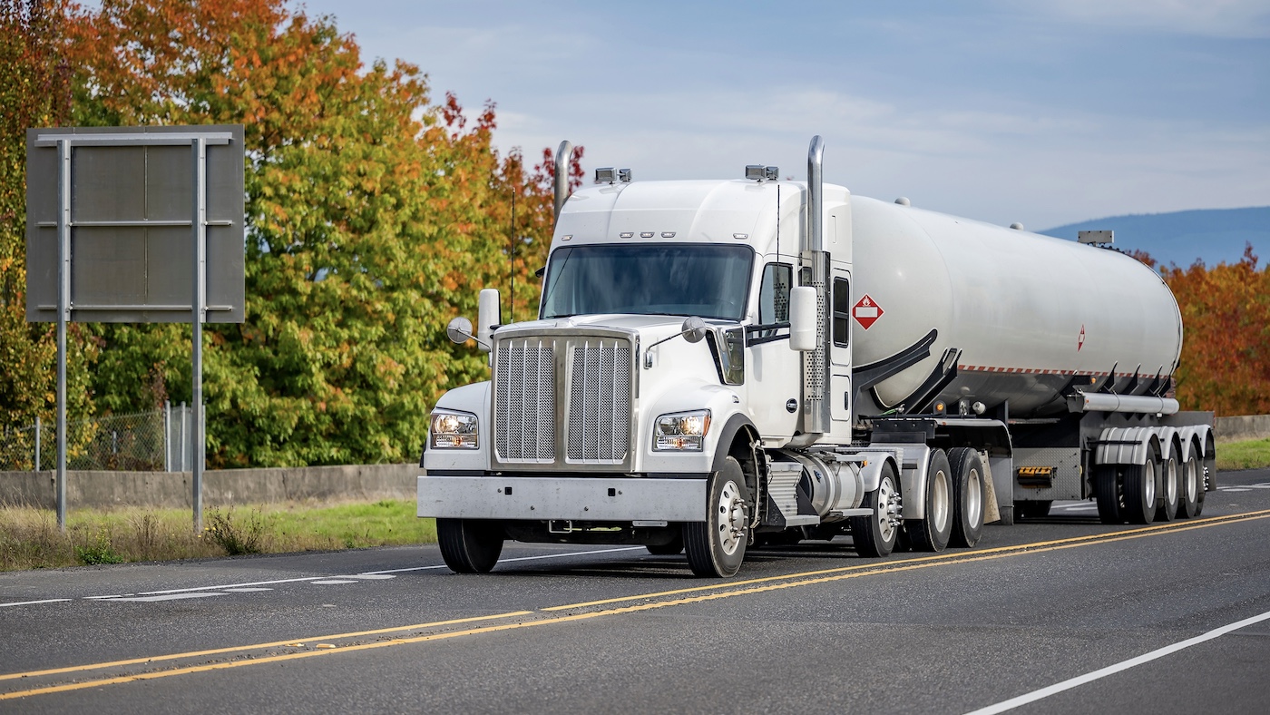 tri-axle fuel trick on the road in autumn